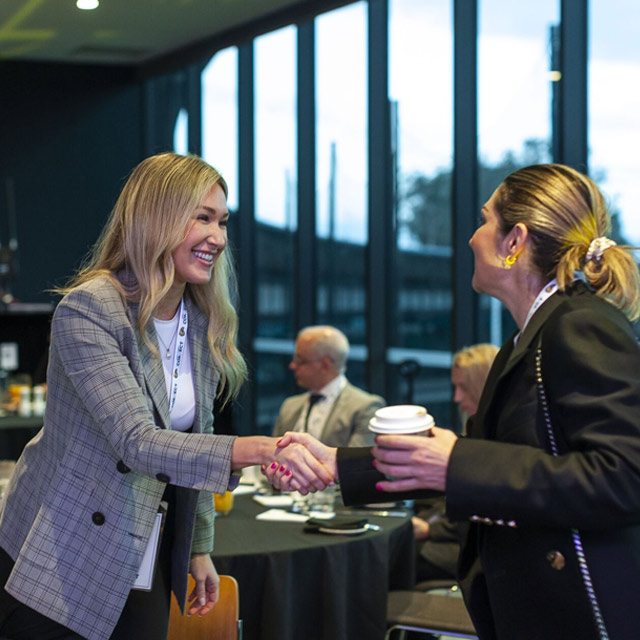 Loopa team member speaking with a client